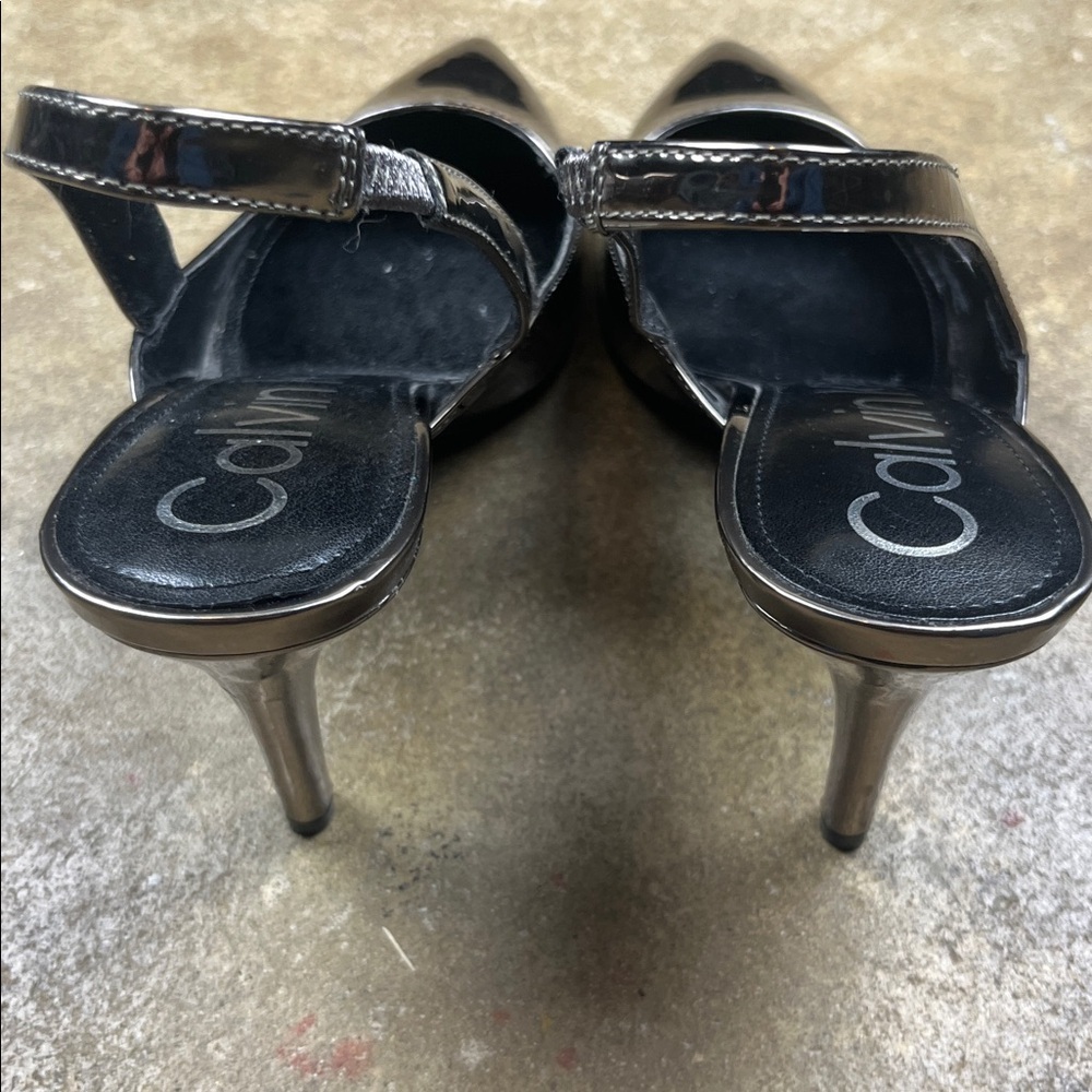 Calvin Klein Metallic Slingback Heels
Size: 9 - Picture 6 of 7